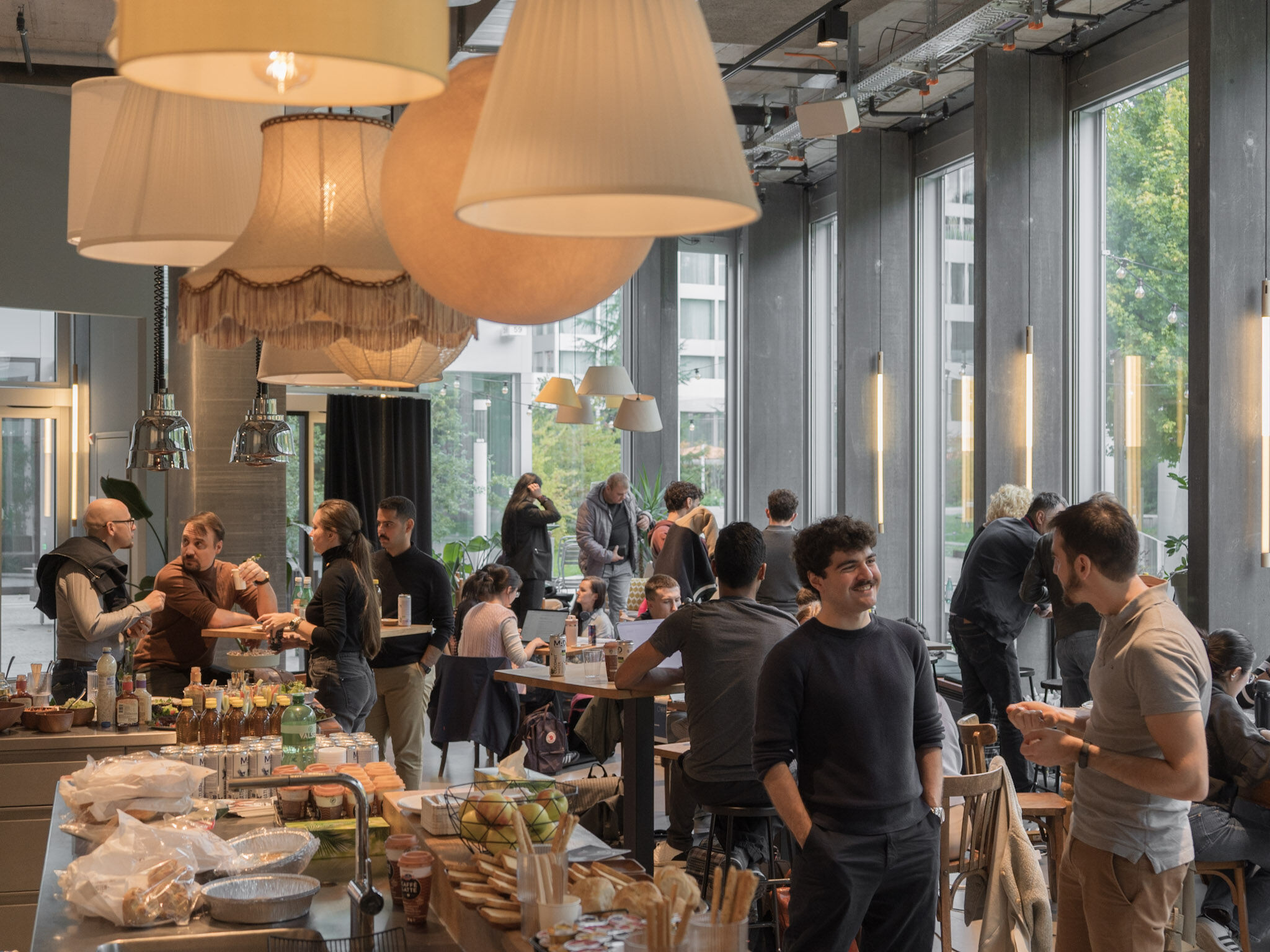 Participants networking over food at NASA Space Apps Challenge Zurich 2025